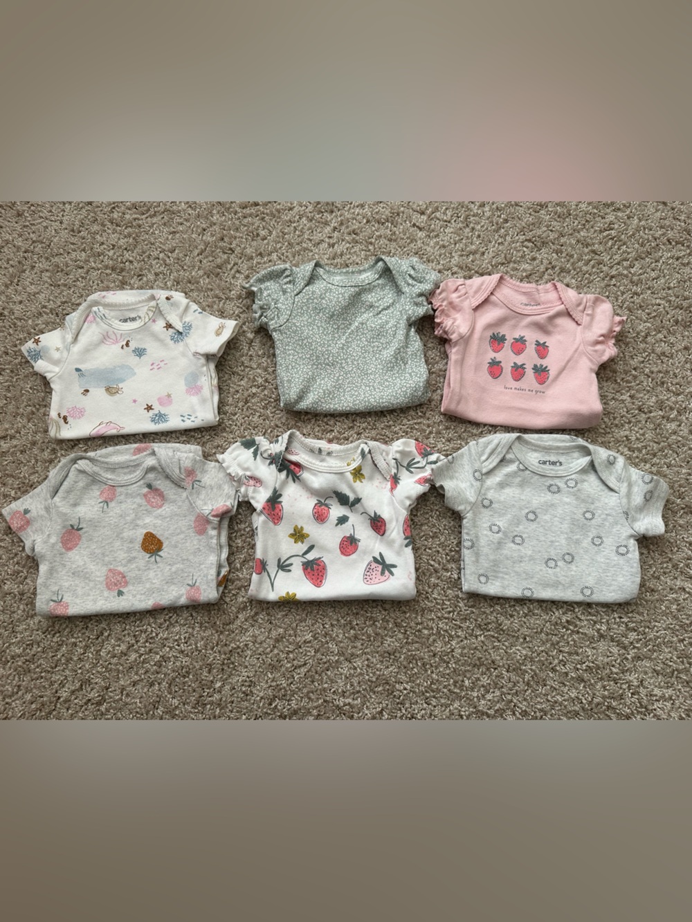 Bundle of baby girl onesies